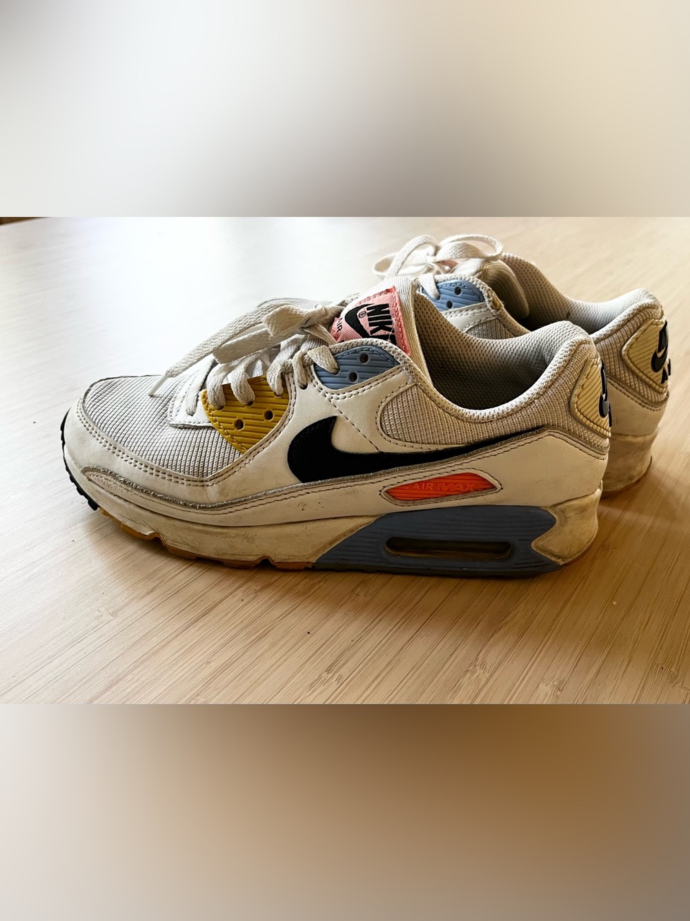 Nike White Sneakers with Black Swoosh and Multicolor Accents